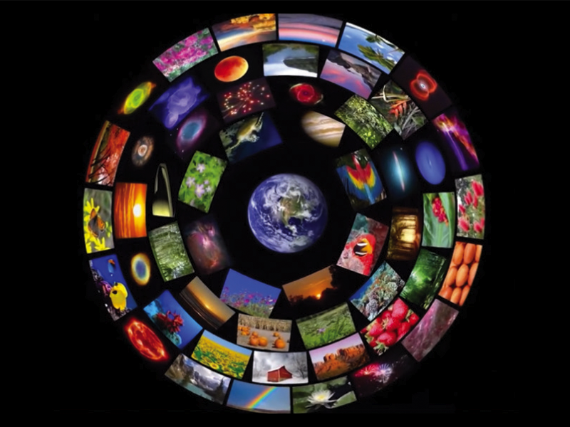 A circular collage of diverse, colorful images representing the electromagnetic spectrum and cosmic phenomena, with Earth in the center.